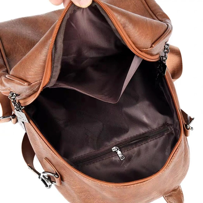 Stylish Brown Backpack with Elephant Embossed Print Design